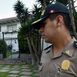 A policeman stands guard outside the residence of Uruguay's ambassador to Peru, after former Peruvian President Alan Garcia requested asylum amid a probe into alleged bribes paid by a Brazilian contractor during his second term in office