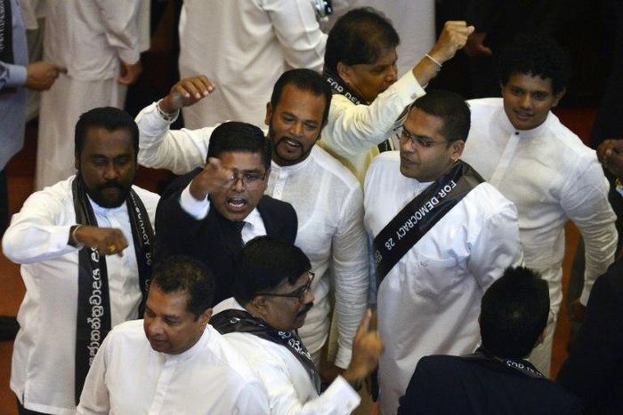 On Wednesday parliament reconvened and lawmakers approved a motion of no-confidence in Rajapakse's cabinet, also passing motions declaring Sirisena's moves as illegal