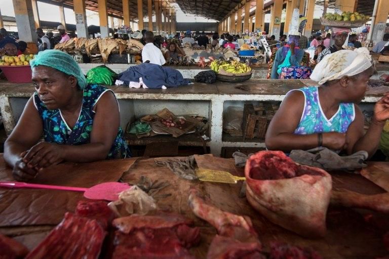 Business is slow, legal vendors say, as economic hardship forces people to buy from the grey and black unofficial market