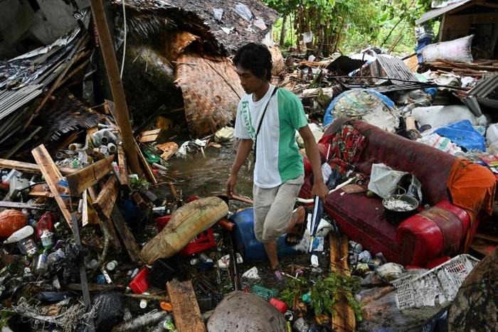 The tsunami swept through Sukarame, destroying houses and cars and killing some villagers, with others still missing in the wreckage