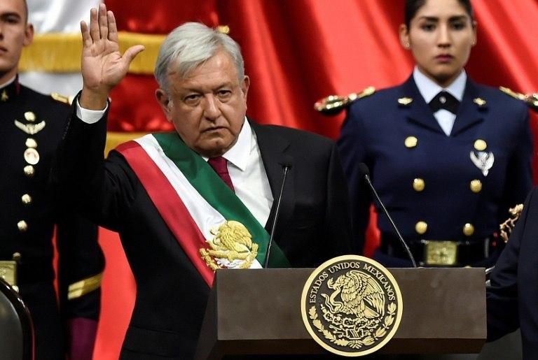Leftist Andres Manuel Lopez Obrador promised the start of a "political regime change" as he swore in as Mexico's president