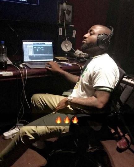 Davido in the studio still kitted in his NYSC uniform
