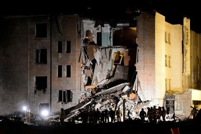 Russia's Emergency Ministry rescuers work at the blast site at the Avangard fireworks factory in Gatchina outside Saint Petersburg