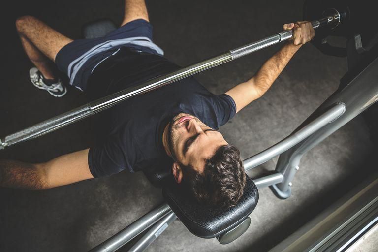 ___9178380___2018___12___7___17___young-man-doing-bench-press-exercise-royalty-free-image-590239962-1544134135