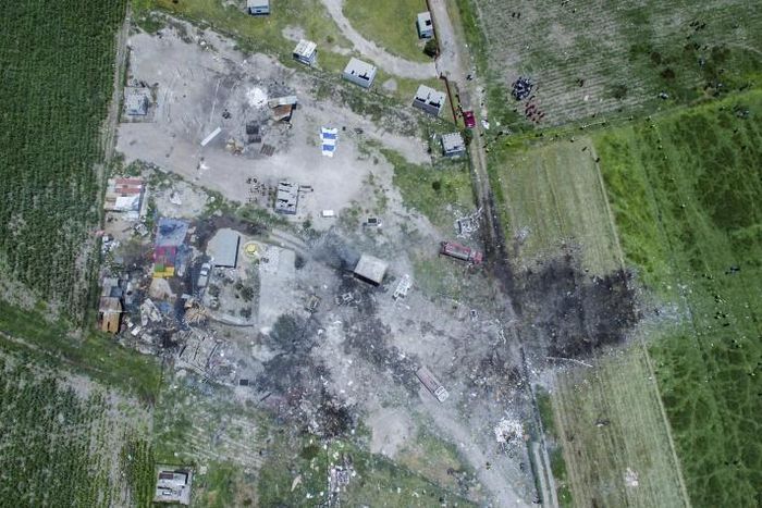 At least two dozen people died in a series of fireworks explosions in July in the town Tultepec, shown here