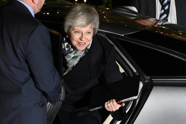Theresa May survived a bid by her own MPs to unseat her