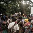 Many residents of a village of the Mbyaka (Pygmy) people gather in Bayanga after a trek for the cinema night