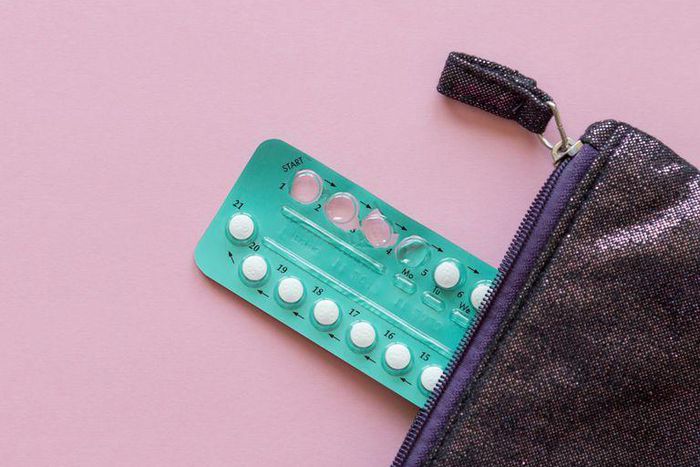 ___9136639___2018___11___25___13___high-angle-view-contraceptive-pill-and-purse-over-royalty-free-image-1054343234-1541793229