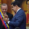 Venezuelan President Nicolas Maduro decorates Turkish President Recep Tayyip Erdogan with the Order of the Liberator in Caracas