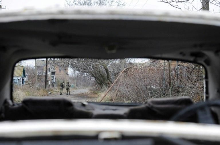 Soldiers patrol the front line with Russia-backed separatists