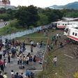 All eight carriages on the Puyuma Express train in Taiwan were derailed and five flipped onto their side in the accident