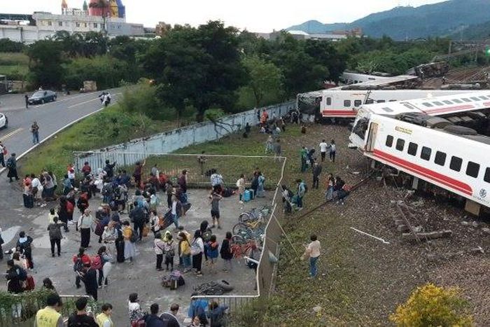All eight carriages on the Puyuma Express train in Taiwan were derailed and five flipped onto their side in the accident