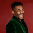 Ebuka cracks a smile in a green velvet blazer