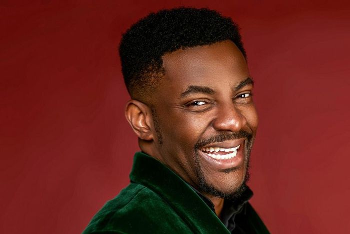 Ebuka cracks a smile in a green velvet blazer
