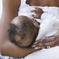 A Nigerian mum breastfeeding her baby