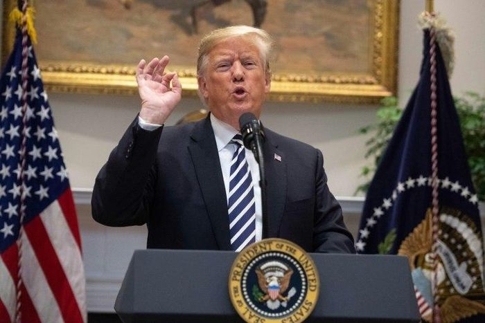 Trump told journalists at the White House that a group of several thousand migrants attempting to walk from Central America through Mexico had thrown rocks "viciously and violently" at Mexican police