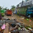 Debris from damaged buildings is strewn across a road in Carita after the area was hit by a tsunami following an eruption of the Anak Krakatoa volcano