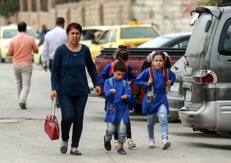 Many parents in northeastern Syria, most of which is controlled by Kurdish authorities, are opting to enrol their children in overcrowded state-run schools despite the complex commute