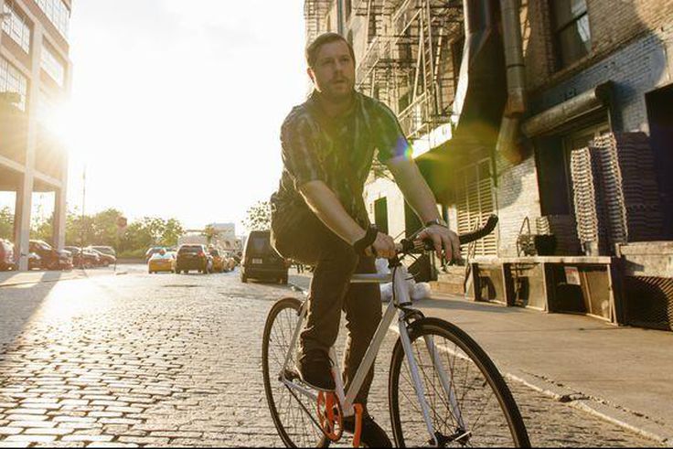 ___9155582___2018___11___30___21___male-messenger-cycling-along-city-street-royalty-free-image-521814377-1543598611