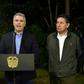 Colombian President Ivan Duque (C) speaks next to Colombian Defense Minister Guillermo Botero (L) and Colombian Attorney General Nestor Humberto Martinez (R) at the Narino presidential palace in Bogota on December 21, 2018