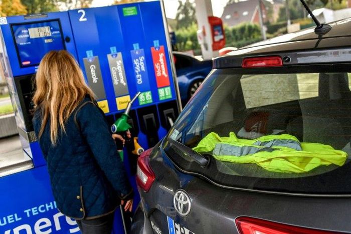 The yellow vest is the symbol of the French drivers protesting against the rising price of fuel