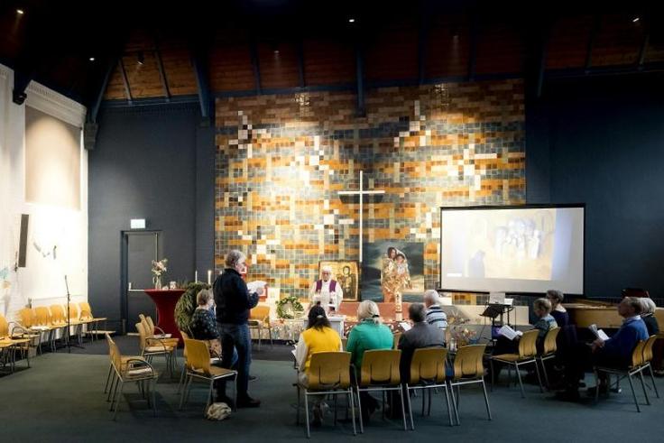 A church in the Haque is holding non-stop services to stop Dutch authorities serving a deportation order on an Armenian family seeking asylum in the Netherlands .
