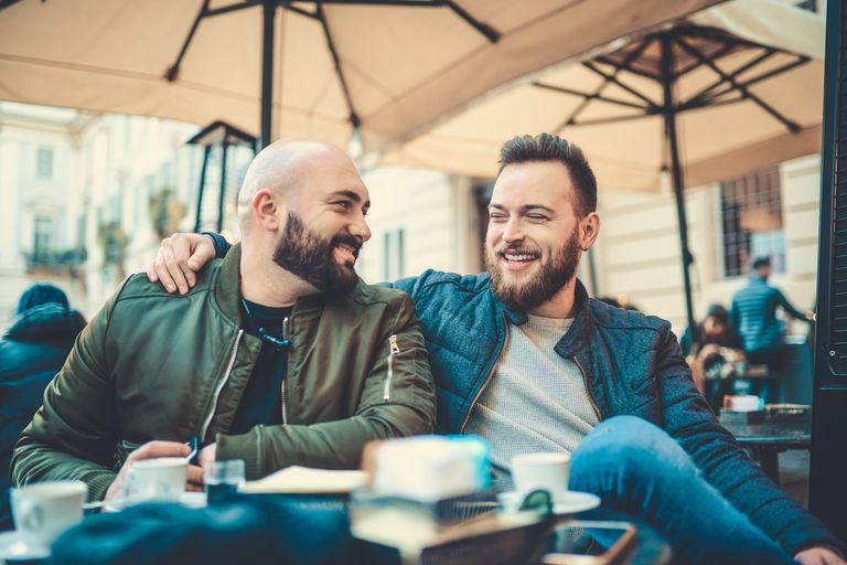 ___9125347___2018___11___21___9___two-smiling-friends-drinking-coffee-and-talking-in-royalty-free-image-900314124-1542741012