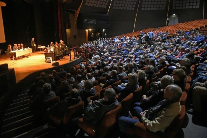 Hundreds of former Goodyear workers and their supporters packed the hall of a convention centre in Amiens, northern France, for the hearing on their factory's closure in 2014