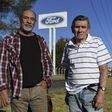 Carlos Propato (L) and Pedro Troiani, former workers of Ford and former political prisoner, pose during an interview with AFP outside Ford’s General Pacheco plant in Buenos Aires on March 16, 2018