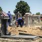 Gravediggers in Johannesburg, where between 45 and 60 graves are re-opened each week on average to allow for second burials