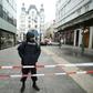 A police officer stands guard in central Vienna after a shooting left one dead. Police ruled out a terrorist link.