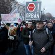 A protester shows his opposition to Prime Minister Viktor Orban's controversial labour reforms during a march in Budapest -- but Orban dismissed the rally as "hysterical shouting"