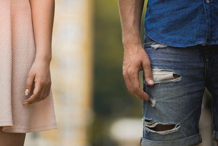 ___9136238___2018___11___25___8___young-male-and-female-standing-next-to-each-other-royalty-free-image-882193260-1542814921