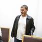 Russian Mikhail Botsjkarev (R) has been remanded by a Norwegian court for two more weeks on suspicion of spying at the Norwegian parliament