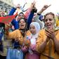 Moroccans shout slogans during a protest calling for gender equality as they mark International Women's Day in Rabat on March 8, 2015
