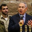 Israeli Prime Minister Benjamin Netanyahu, seen here during a menorah-lighting ceremony with Israeli soldiers for Hanukkah, has hailed majority backing at the UN for condemning militant group Hamas even though a US draft resolution failed to pass