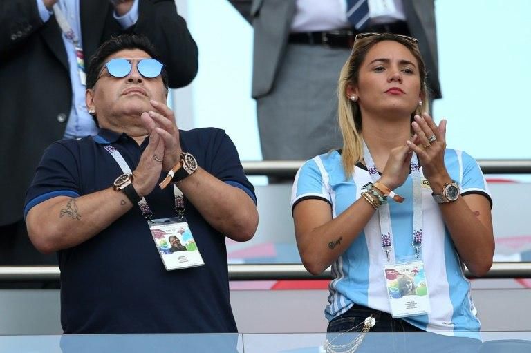 Diego Maradona, here with gilfriend Rocio Oliva, cheered on Argentina in Russia