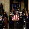 The casket bearing the remains of former US President George H.W. Bush arrives at the US Capitol during the State Funeral in Washington, DC, December 3, 2018