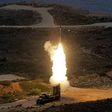 Greek troops on exercise fire an S-300 surface-to-air missile like those delivered to Syria after a September Israeli strike during which a Russian aircraft was accidentally downed