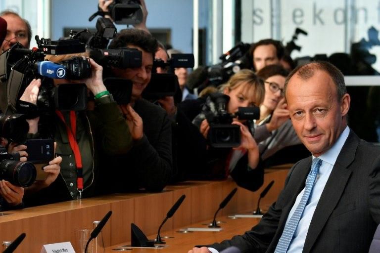 The other front-runner is former CDU parliamentary group leader Friedrich Merz, an old rival of Merkel