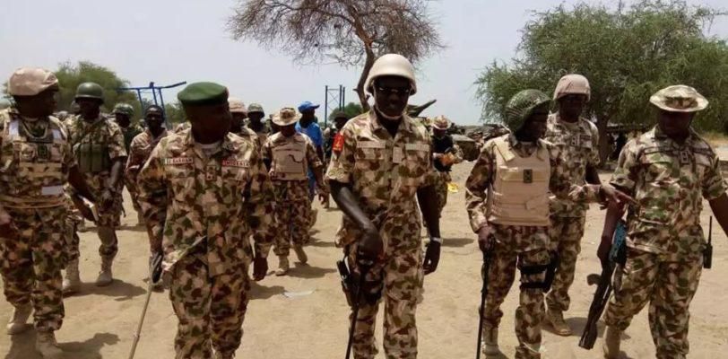 Army chief Lt. Gen. Tukur Buratai (M) in the midst of other senior officers