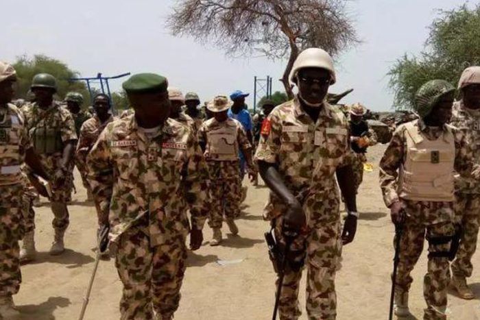Army chief Lt. Gen. Tukur Buratai (M) in the midst of other senior officers