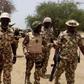 Army chief Lt. Gen. Tukur Buratai (M) in the midst of other senior officers