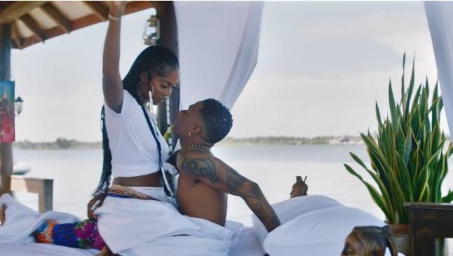 Wizkid and his love interest in the new 'Fever' video