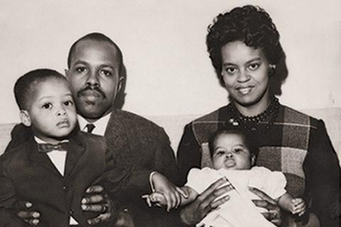 Baby Michelle with her parents, Fraser and Marian Robinson, and brother, Craig.