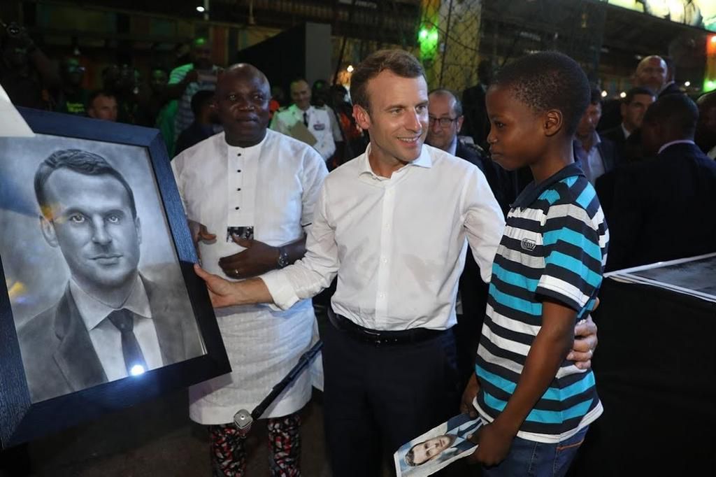 The President of France Emmanuel Macron showed that he was impressed with Kareem Waris Olamilekan's drawing of him.