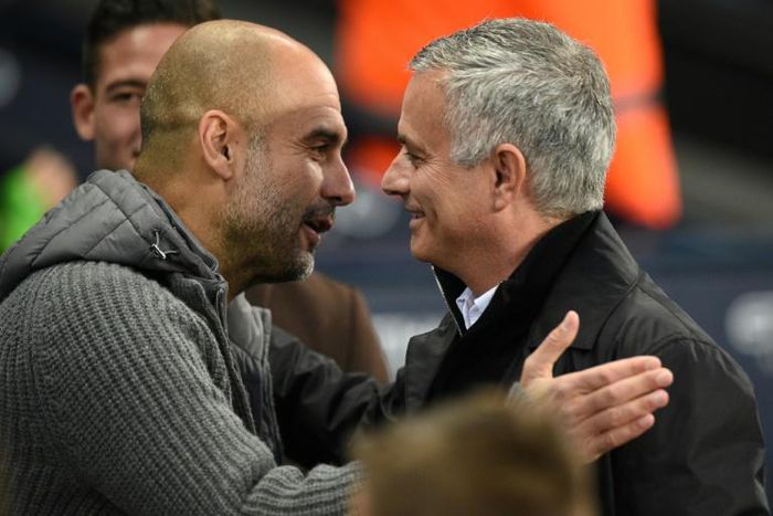 Pep Guardiola's Manchester City are outspending Manchester United, managed by Jose Mourinho (right)
