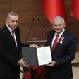 Turkey's President Recep Tayyip Erdogan (L) unveiled his former prime minister and national assembly speaker Binali Yildirim as the ruling party candidate for mayor of Istanbul