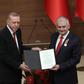Turkey's President Recep Tayyip Erdogan (L) unveiled his former prime minister and national assembly speaker Binali Yildirim as the ruling party candidate for mayor of Istanbul