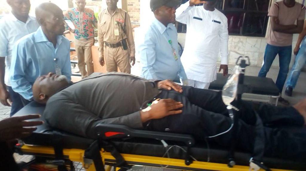 Senator Dino Melaye wheeled into an Abuja hospital on a stretcher